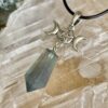 This is a green fluorite pendant with triple goddess and pentacle. for connection and protection thecrystalcave.com.au