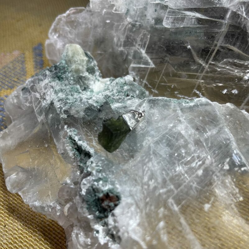 This is magnificent moldavite pendant set in 927 stirling silver thecrysalcave.com.au