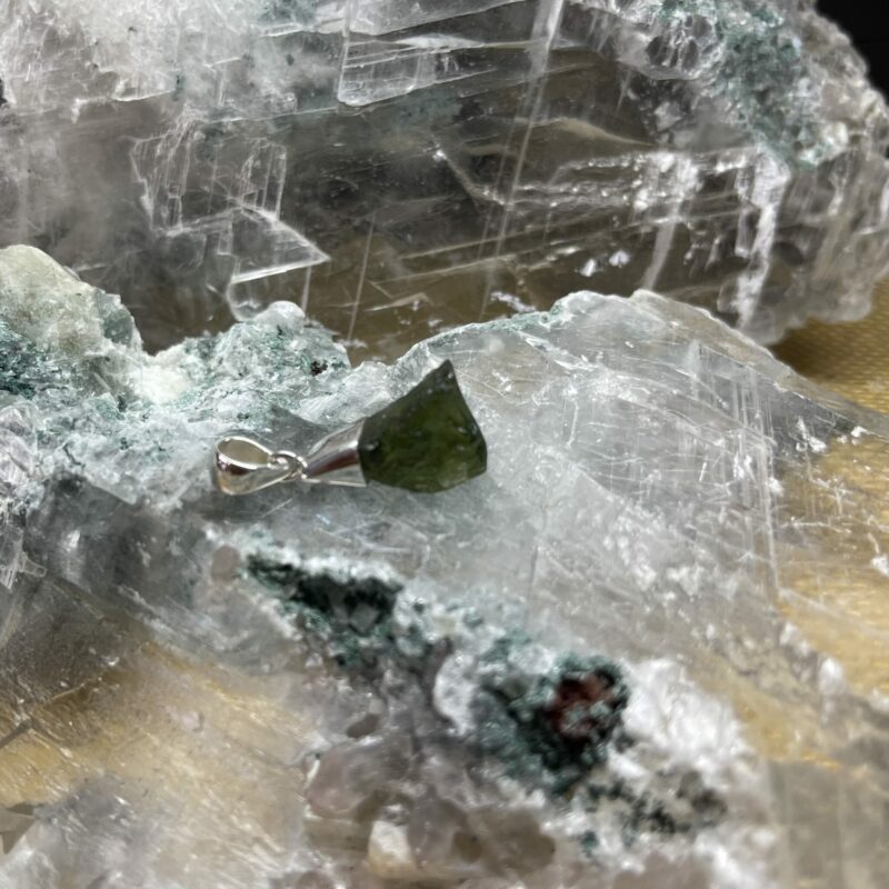 This is magnificent moldavite pendant set in 927 stirling silver thecrysalcave.com.au