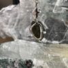 this is magnificent moldavite with herkimer diamond silver pendant thecrystalcave.com.au