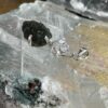 this is magnificent moldavite with herkimer diamond silver pendant thecrystalcave.com.au