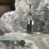 this is beautiufl moldavite with golden rutile silver pendant