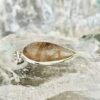 This is a beautiful Tear drop shaped golden rutile cabochon pendant. It is set in 925 silver. thecrystalcave.com.au