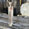 This is a Colombian Lemurian 'Blade of Light' pendant set in 925 silver. Water clear they are high vibrational stones, clarity and joy. thecrystalcave.com.au