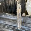 This is a Colombian Lemurian 'Blade of Light' pendant set in 925 silver. Water clear they are high vibrational stones, clarity and joy. thecrystalcave.com.au