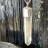 This is a Colombian Lemurian 'Blade of Light' pendant set in 925 silver. Water clear they are high vibrational stones, clarity and joy. thecrystalcave.com.au