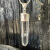 This is a Colombian Lemurian 'Blade of Light' pendant set in 925 silver. Water clear they are high vibrational stones, clarity and joy. thecrystalcave.com.au