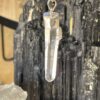This is a Colombian Lemurian 'Blade of Light' pendant set in 925 silver. Water clear they are high vibrational stones, clarity and joy. thecrystalcave.com.au