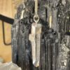 This is a Colombian Lemurian 'Blade of Light' pendant set in 925 silver. Water clear they are high vibrational stones, clarity and joy. thecrystalcave.com.au