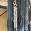 This is a Colombian Lemurian 'Blade of Light' pendant set in 925 silver. Water clear they are high vibrational stones, clarity and joy. thecrystalcave.com.au