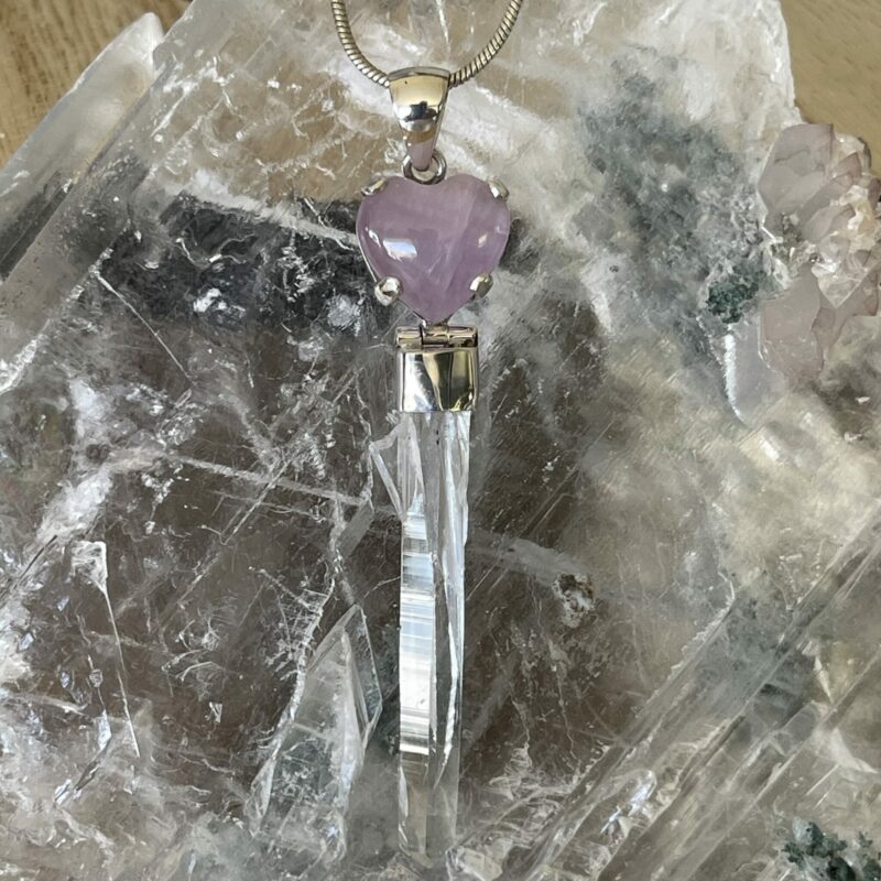 This is a Kunzite Heart and Colombian Lemurian or Blade of Light in 925 Silver pendant. Delicious to see, beautiful to wear. thecrystalcave.com.au
