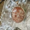this is an oval sunstone pendant set in 925 stirling silver. it is quite beautiful. Sunstone is a stone of joy. thecrystalcave.com.au