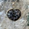 This is a Mystic Merlinite heart set in 927 silver pendant. Its energy opens the doorways of magic and ritual. Favoured for centuries by Druids and Shaman alike, its protective energies are revered, as it deflects negative energies.  thecrystalcave.com.au