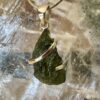 This is a beautiful moldavite 925 sterling silver pendant. Wear it daily. thecrystalcave.com.au