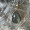 This is a beautiful Labradorite cabochon pendant in Stirling silver. thecrystalcave.com.au