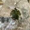 This is a beautiful moldavite 925 sterling silver pendant. Wear it daily. thecrystalcave.com.au
