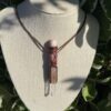 This isTalisman of Clear Empath with rohodocrosite, rose quartz, columbian lemurian blade of light quartz